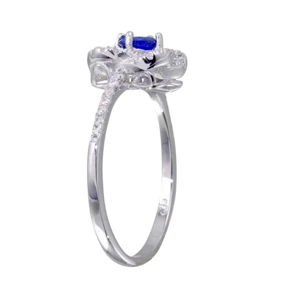 Sterling Silver 925 Rhodium Plated CZ Knot Blue Center Stone Ring